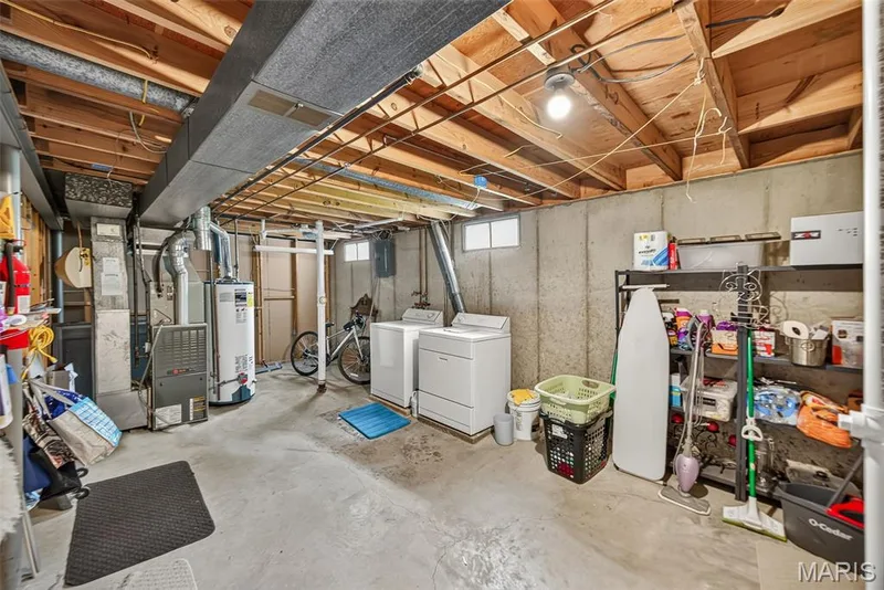 Laundry area and storage — 3210 Catesby Lane, St Charles, MO 63301