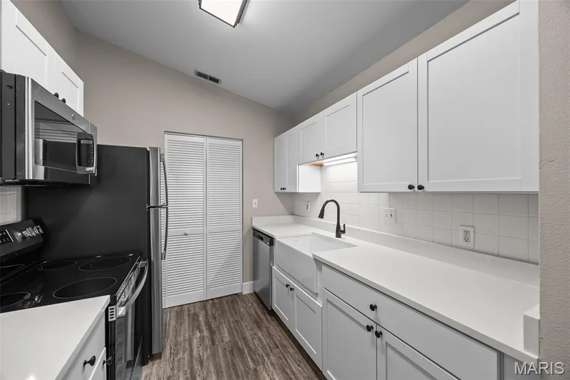 You'll love the farmhouse style sink! — 2419 Sandalwood Creek Court #F, Wildwood, MO 63038