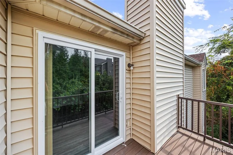 Step out to balcony from Living Room — 2419 Sandalwood Creek Court #F, Wildwood, MO 63038