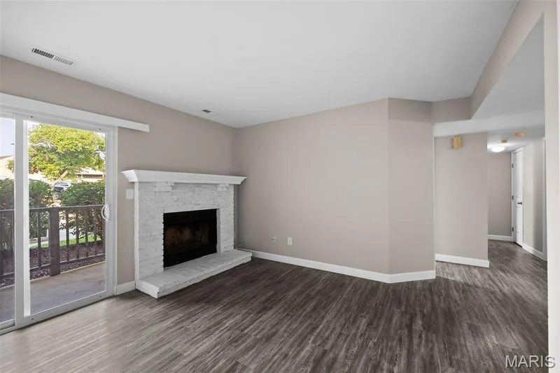 Living Room with walk out to patio. — 2343 Sandalwood Creek Court #C, Wildwood, MO 63038