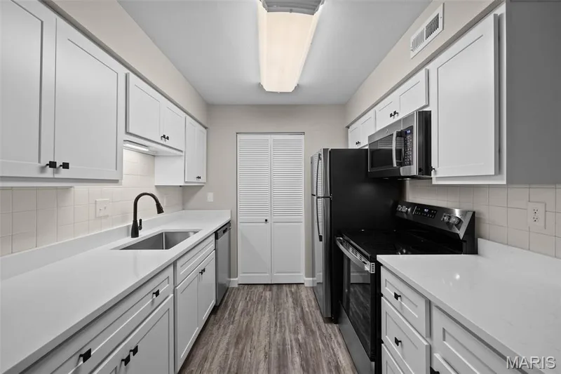 Updated Kitchen with new cabinets, granite counter tops and new appliances, — 2343 Sandalwood Creek Court #C, Wildwood, MO 63038