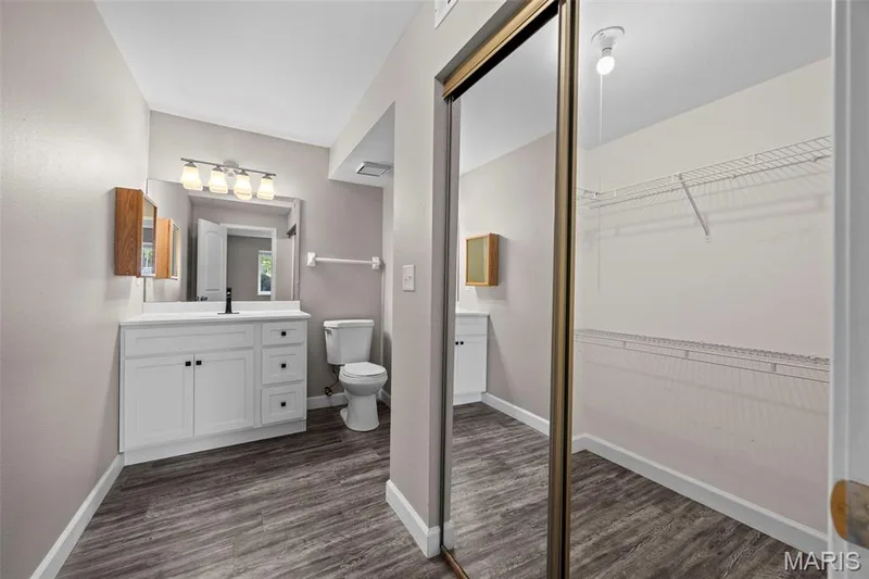 Primary Closet and Primary Bath — 2343 Sandalwood Creek Court #C, Wildwood, MO 63038