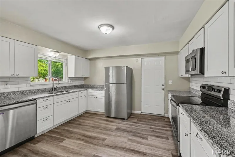 513 Kent Drive, Wentzville, MO 63385 — listing photo 7 of 25