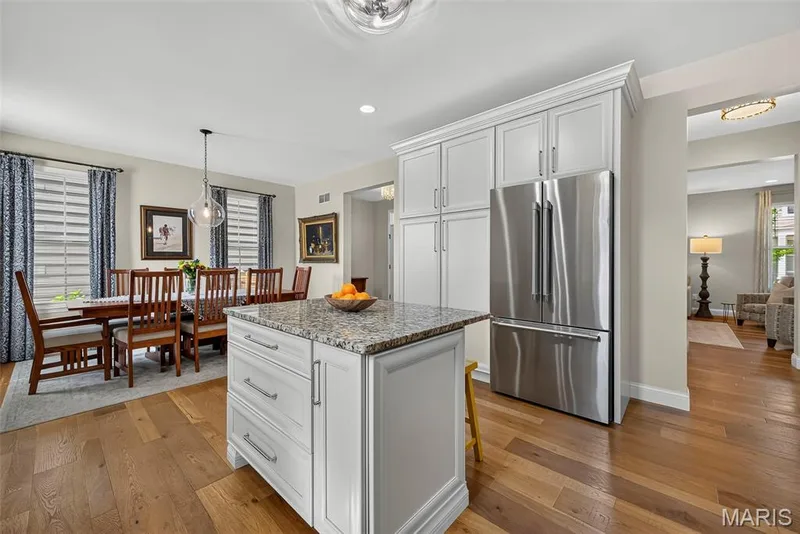 Kitchen Remodeled in 2020 With Engineered Hardwood, 42" Cabinets, Granite Countertops, Wolf Gas Stove with Wolf Hood, Double Door Bosch Refrigerator, and Bosch Dishwasher. — 3253 Camp Street, St Charles, MO 63301
