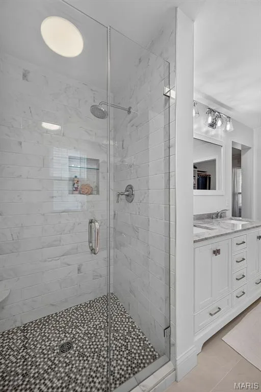 Remodeled Primary Bathroom with Tile Stand Up Shower and Double Vanity — 3253 Camp Street, St Charles, MO 63301