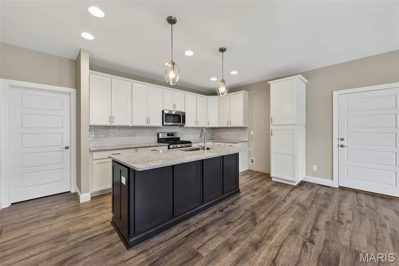 Contrast Island with Granite Countertops — 146 Haven Ridge Court, Dardenne Prairie, MO 63368