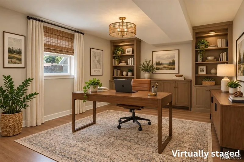 This bonus room with a window can be whatever you want it to be. Show here as an office. — 16 Saint Michael Drive, St Peters, MO 63376