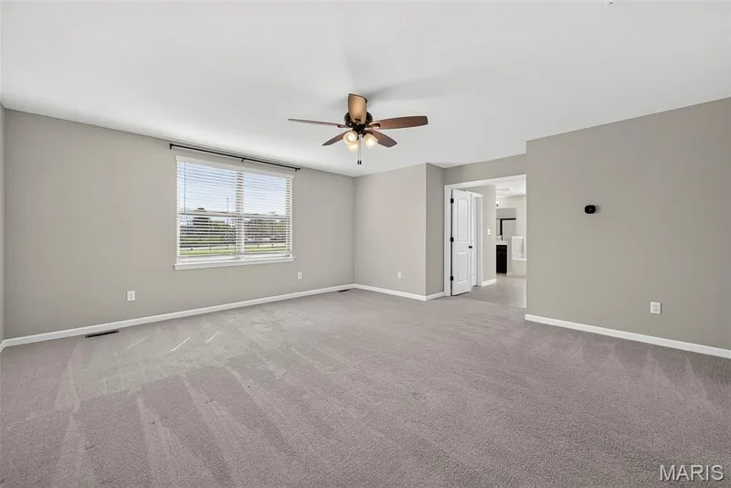 Spacious Primary Bedroom Suite with Double Door Entry into Primary Bath — 106 Downview Drive, O'Fallon, MO 63368