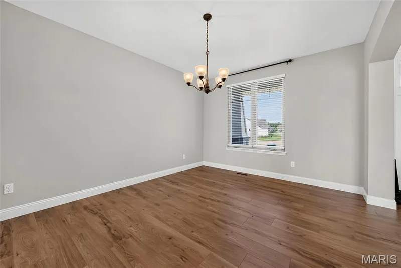 Dining Room with 9 Foot Ceilings and Luxury Vinyl Plank Flooring — 106 Downview Drive, O'Fallon, MO 63368