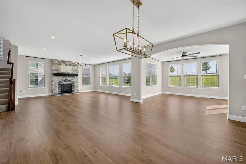 Breakfast Room, Sun/Hearth Room and Great Room with 9 Foot Ceilings and Luxury Vinyl Plank Flooring — 106 Downview Drive, O'Fallon, MO 63368