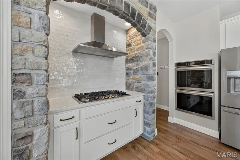 Gas Cooktop and Chimney Range Hood with Stone Surround — 106 Downview Drive, O'Fallon, MO 63368