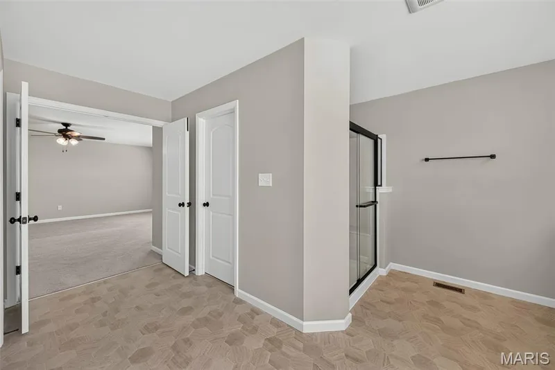 Two Walk in Closets in Primary Bath with Double Door Entry to Primary Bedroom — 106 Downview Drive, O'Fallon, MO 63368