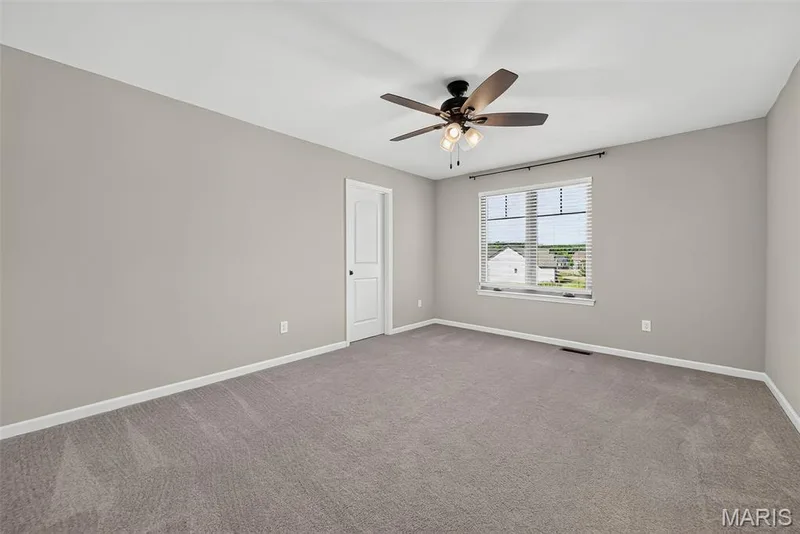 Secondary Bedroom with Walk in Closet and Shared Bath — 106 Downview Drive, O'Fallon, MO 63368