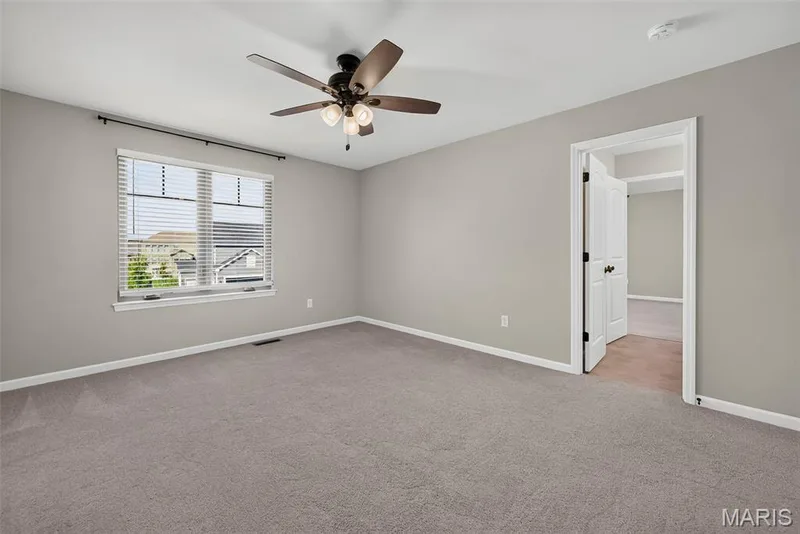 Secondary Bedroom with Walk in Closet and Shared Bath — 106 Downview Drive, O'Fallon, MO 63368