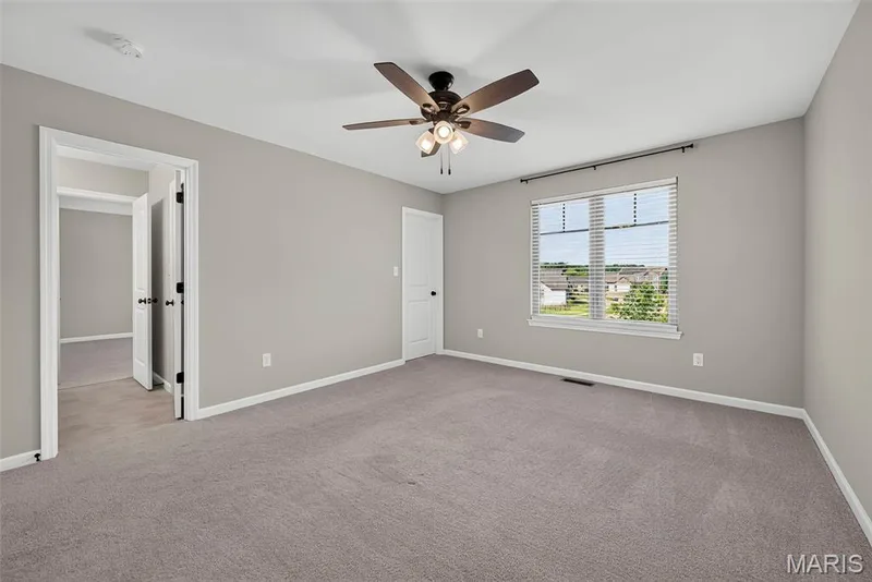 Secondary Bedroom with Walk in Closet and Shared Bath — 106 Downview Drive, O'Fallon, MO 63368