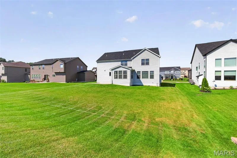 Rear Elevation with Patio and Lawn Irrigation — 106 Downview Drive, O'Fallon, MO 63368