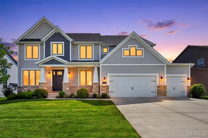 Front Elevation at Dusk — 106 Downview Drive, O'Fallon, MO 63368