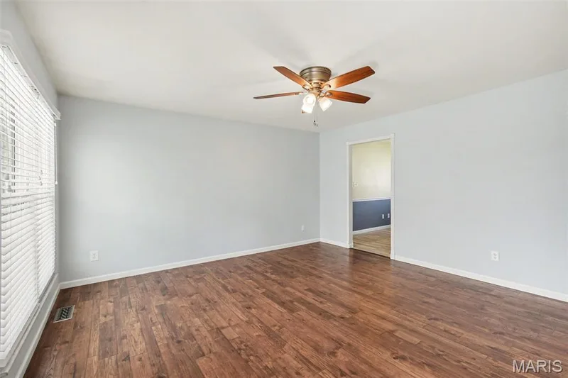 Eat-in kitchen, basement access and garage access through the opening at rear. — 39 Oxbow Road, St Peters, MO 63376