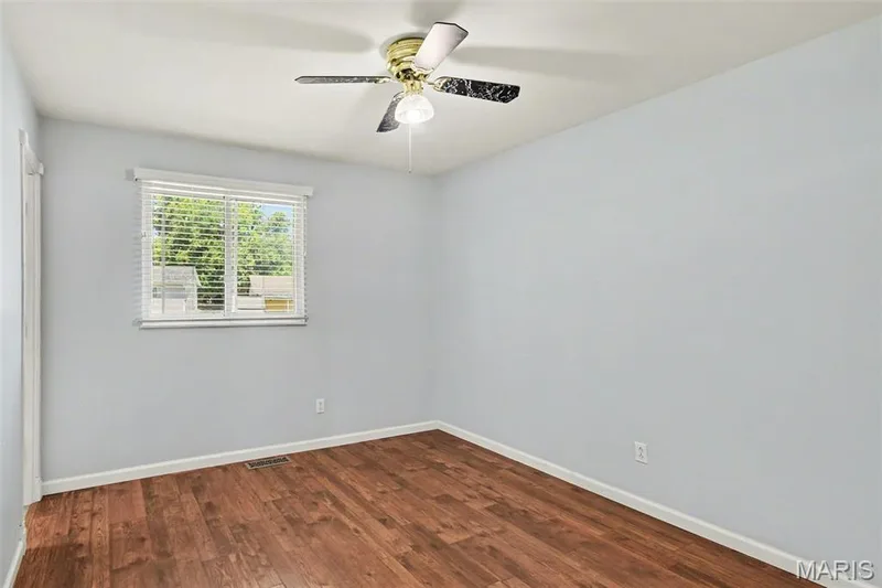 Primary bedroom comes equipped with yet another lighted ceiling fan! — 39 Oxbow Road, St Peters, MO 63376