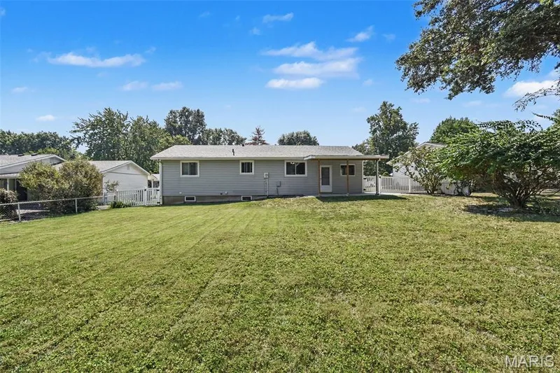 All this AND a fenced, level back yard with oversized, covered patio and unlimited potential!psst... by the way - the gate is large enough for a zero-turn mower! — 39 Oxbow Road, St Peters, MO 63376