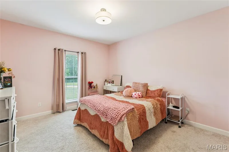 Wall-to-wall carpeting and a single window with blinds — 5 Timberdel Place, Foristell, MO 63348