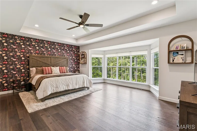 Recessed lighting, ceiling fan, coffered, wood-finish flooring, and bay windows — 5 Timberdel Place, Foristell, MO 63348