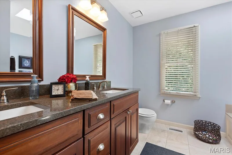 En Suite Primary Bathroom WIth Double Vanity — 1131 Black Forest Drive, St Charles, MO 63301