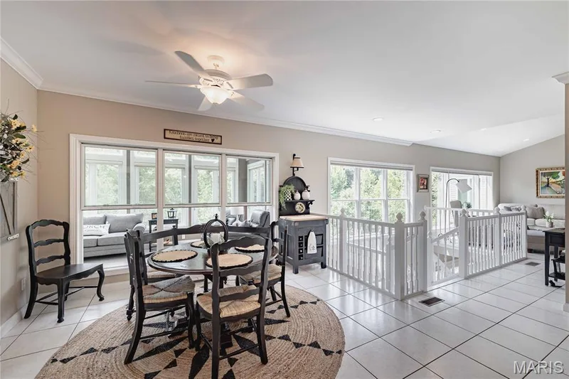 Stunning kitchen view of breakfast room, sunroom and atrium windows — 4484 Kingfisher Court, Augusta, MO 63332