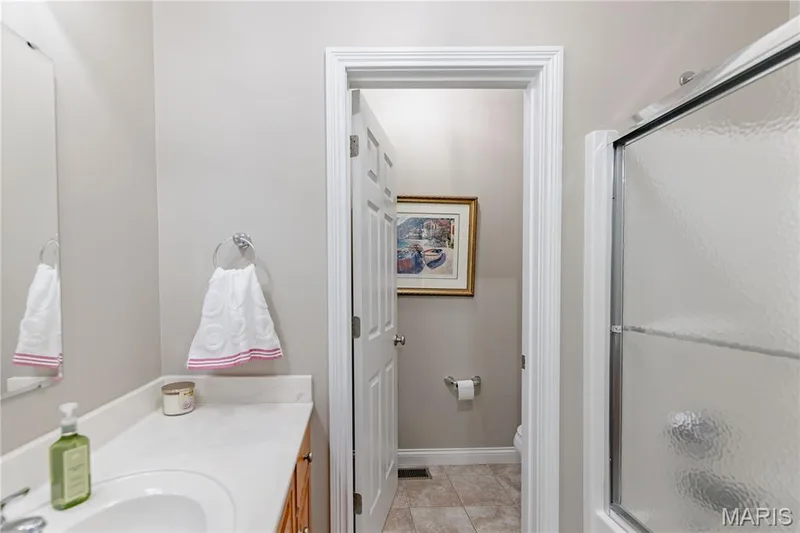 Main Floor Bedroom #2 with full ensuite bath — 4484 Kingfisher Court, Augusta, MO 63332