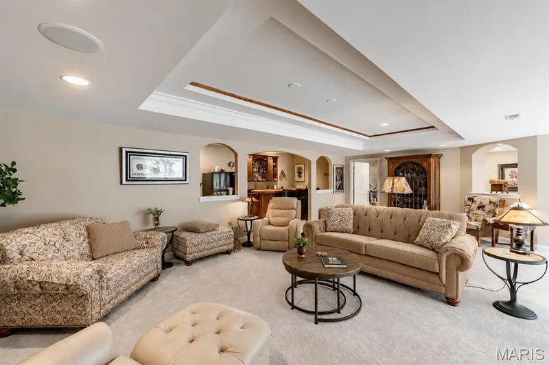 Lower level family room with bar area — 4484 Kingfisher Court, Augusta, MO 63332