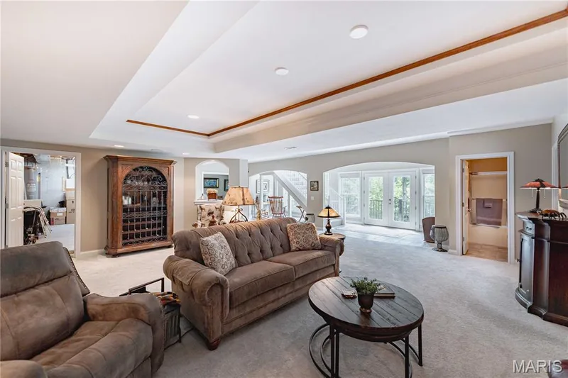 Ample natural light from the 2 story atrium overlooking the lake — 4484 Kingfisher Court, Augusta, MO 63332