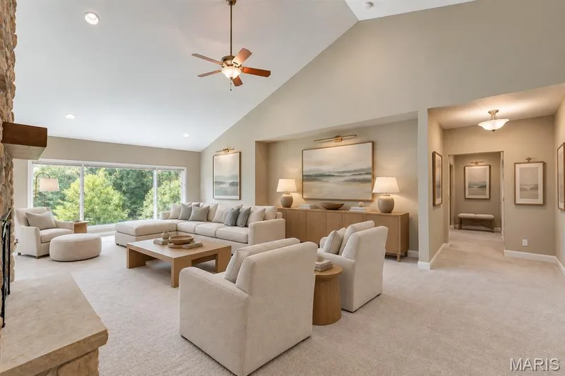 Great room with vaulted ceilings, gas fireplace and stone surround (new 2023) — 4484 Kingfisher Court, Augusta, MO 63332