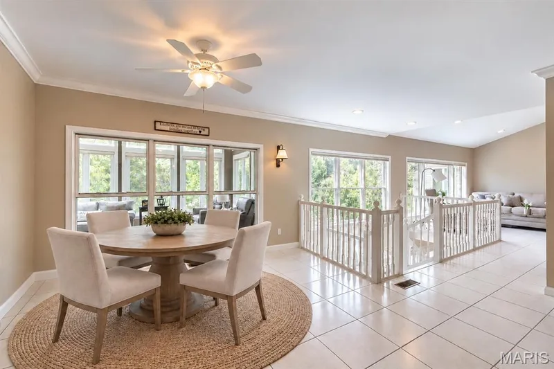 Stunning kitchen view of breakfast room, sunroom and atrium windows — 4484 Kingfisher Court, Augusta, MO 63332