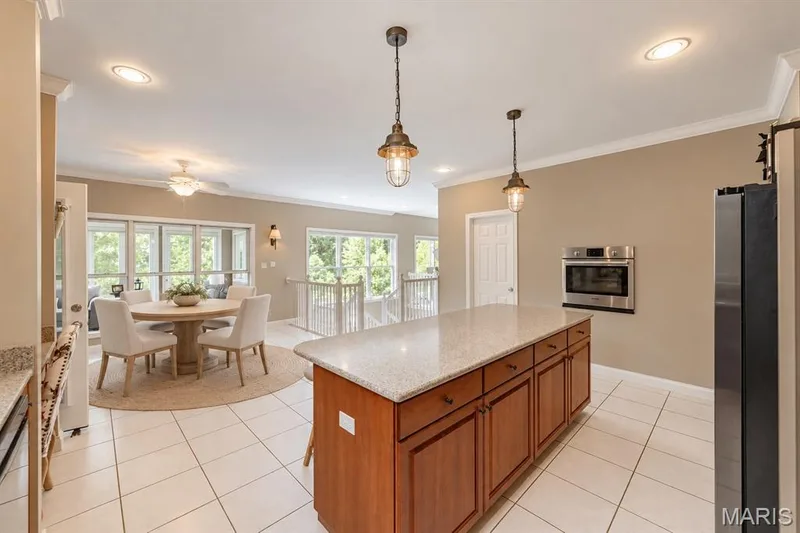Chefs dream kitchen overlooking the atrium windows and lake — 4484 Kingfisher Court, Augusta, MO 63332