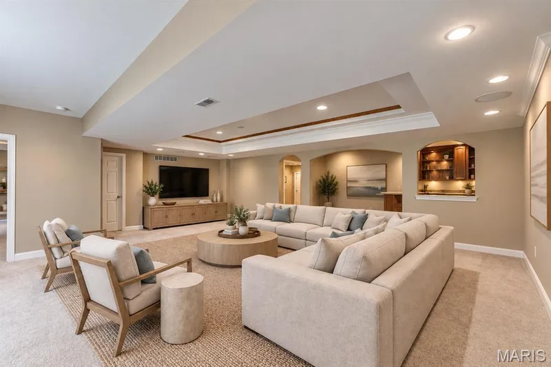 Finished lower level with 2 bedrooms, full bath, media/bonus room, bar and ample storage — 4484 Kingfisher Court, Augusta, MO 63332