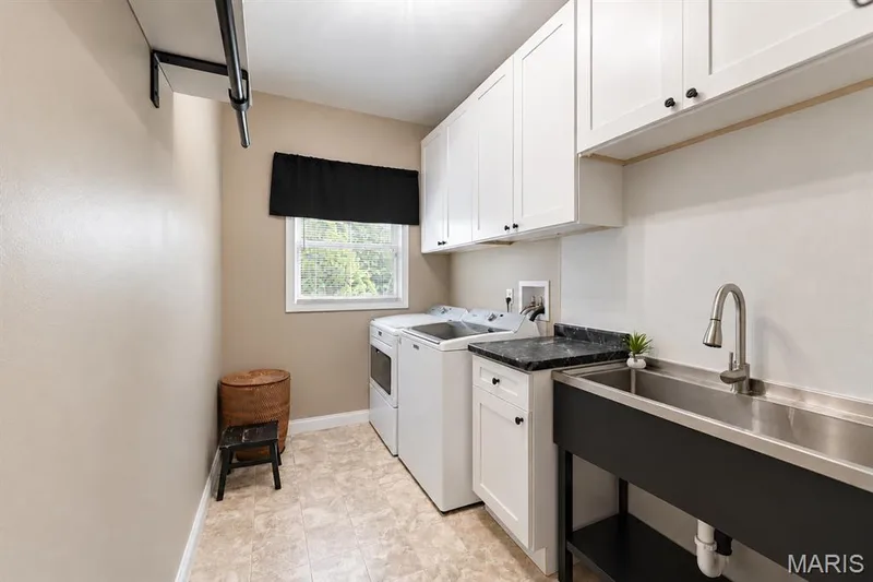 Large main floor laundry with oversized new sink — 4484 Kingfisher Court, Augusta, MO 63332