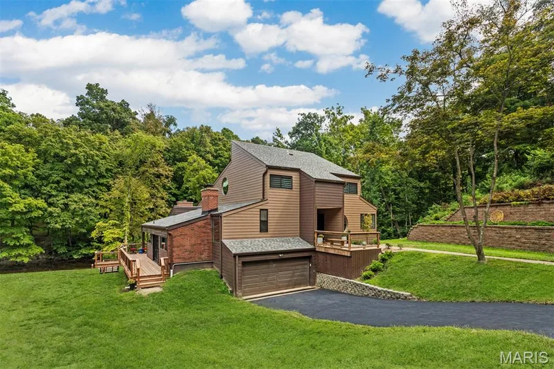 This outstanding example of mid century design was created and owned by renowned architect Tom Hall. See supplements for history and bio**grass digitally enhanced** — 35 Arrowhead Estates Court, Chesterfield, MO 63017
