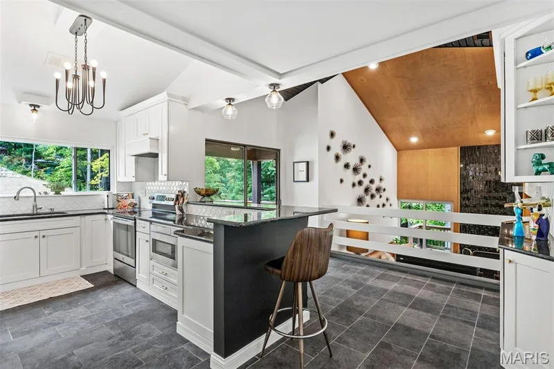 Designed around the landscape, natural light and views of the woods and water at every turn — 35 Arrowhead Estates Court, Chesterfield, MO 63017