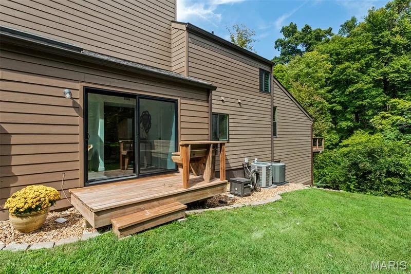 Private deck with  built-in bench off  office — 35 Arrowhead Estates Court, Chesterfield, MO 63017