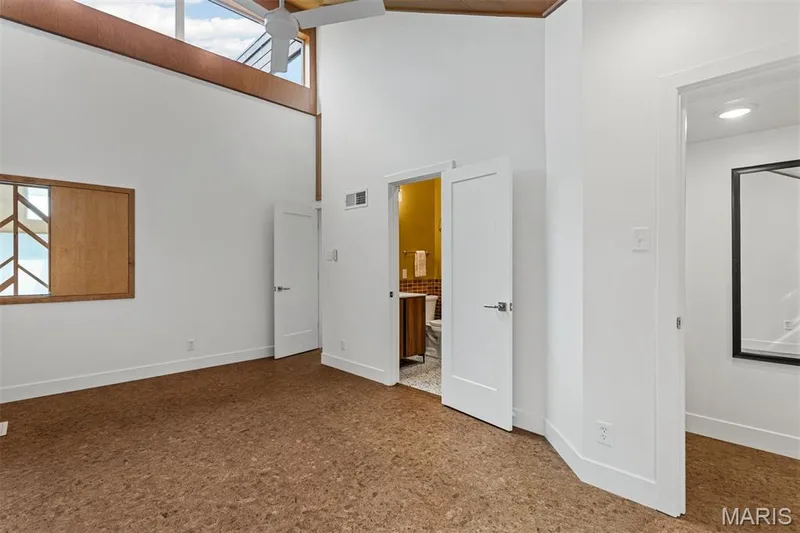 3rd bedroom has large transom window, custom wood screen (as other two bedrooms), ensuite bath and a walk in closet. — 35 Arrowhead Estates Court, Chesterfield, MO 63017
