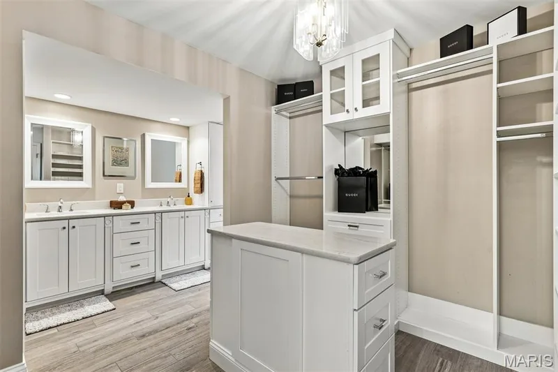 Custom primary closet — 35 Arrowhead Estates Court, Chesterfield, MO 63017