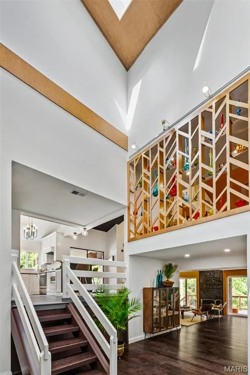 Atrium highlighted by custom designed and wood screens created by sellers — 35 Arrowhead Estates Court, Chesterfield, MO 63017