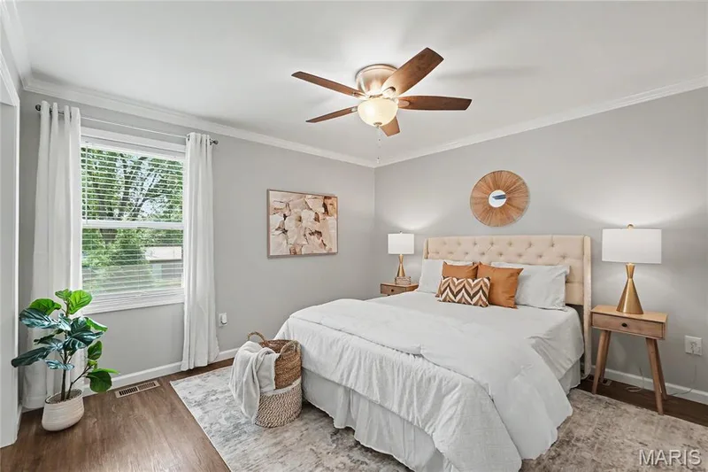 2nd bedroom has a ceiling fan and white trim moulding — 31 Plackemeier, O'Fallon, MO 63366