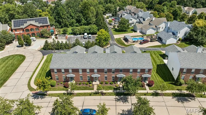 In this beautifully maintained community, easy living takes center stage. Classic brick charm, a polished streetscape, and a low-maintenance lifestyle mean more time to simply enjoy where you live. — 947 Rolling Thunder Drive, O'Fallon, MO 63368