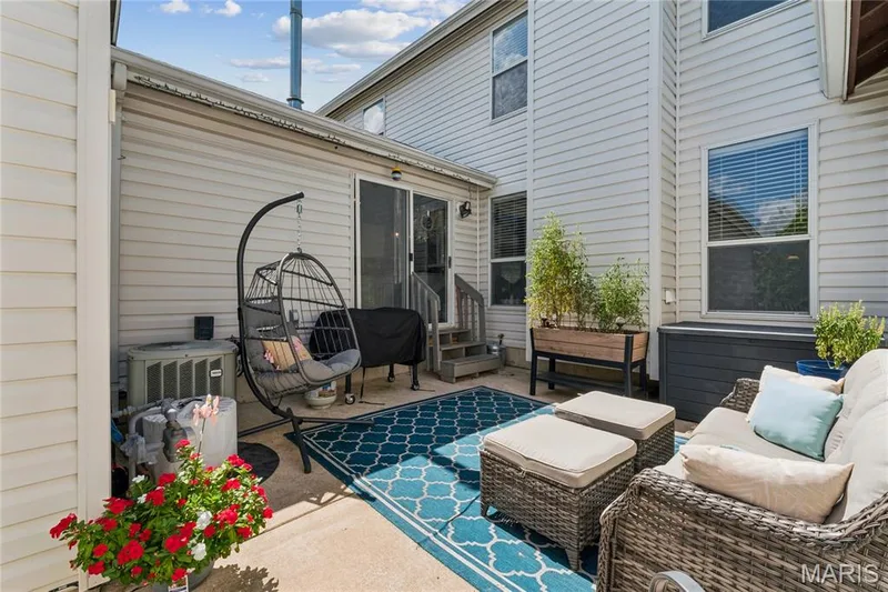 Extend your living space outdoors with a patio made for unwinding or entertaining. With space for comfortable seating, grilling, and greenery, it’s an easy spot to enjoy throughout the seasons. — 947 Rolling Thunder Drive, O'Fallon, MO 63368