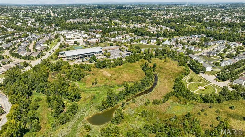 Nature is close to home, too! The Dardenne Greenway Trail is just four minutes away, offering convenient access to scenic trails and green space for walking, biking, and enjoying the outdoors. — 947 Rolling Thunder Drive, O'Fallon, MO 63368