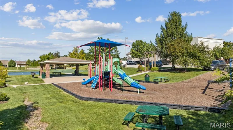 Community amenities make it easy to enjoy more of your time outdoors, with a playground, picnic pavilion, and courts offering plenty of options for recreation close to home. — 947 Rolling Thunder Drive, O'Fallon, MO 63368