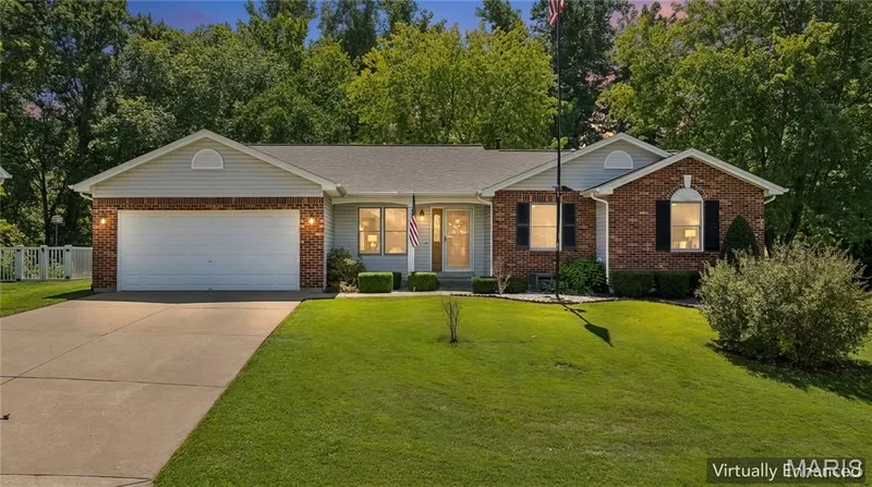 Tucked near the end of a peaceful cul-de-sac, this brick ranch delivers privacy, space, and a shop you won't find anywhere else. — 416 Loiselaine Drive, O'Fallon, MO 63366