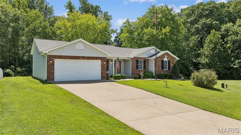 Privacy, space, a rare detached shop, and a floor plan built for real life. You've seen it all, now picture yourself pulling into this driveway every day. Schedule your showing today. — 416 Loiselaine Drive, O'Fallon, MO 63366