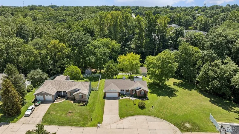 Half an acre of privacy surrounded by mature trees, more space than you'll find in most subdivisions. — 416 Loiselaine Drive, O'Fallon, MO 63366
